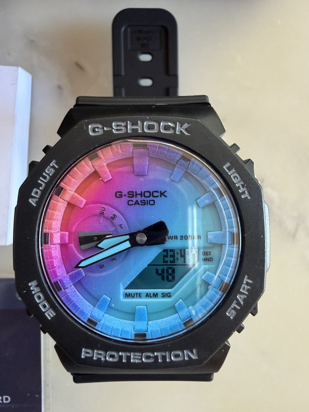 Casio G-Shock Black Watch with Pink and Blue Gradient Dial